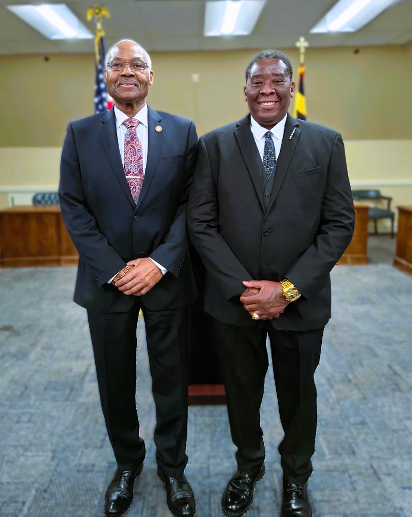 Delegate Darrell Odom with a community leader during a district-facing policy event